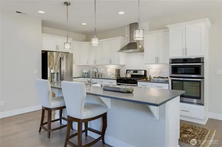 Appliances include a second oven and built-in microwave and natural gas stove. Appliances include a second oven and built-in microwave and natural gas stove.