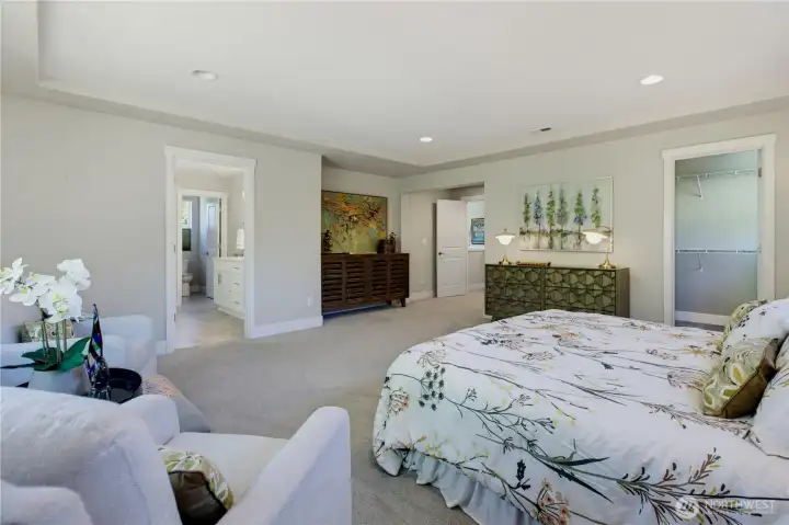 This is the real deal primary with a walk-in closet on the right and one in the bathroom suite. This is the real deal primary with a walk-in closet on the right and one in the bathroom suite.