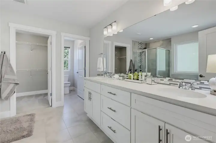 Enclosed walk-in closet and separate enclosed commode. Big double sink and oodles of counter space with granite countertops and tile flooring. Enclosed walk-in closet and separate enclosed commode. Big double sink and oodles of counter space with granite countertops and tile flooring.