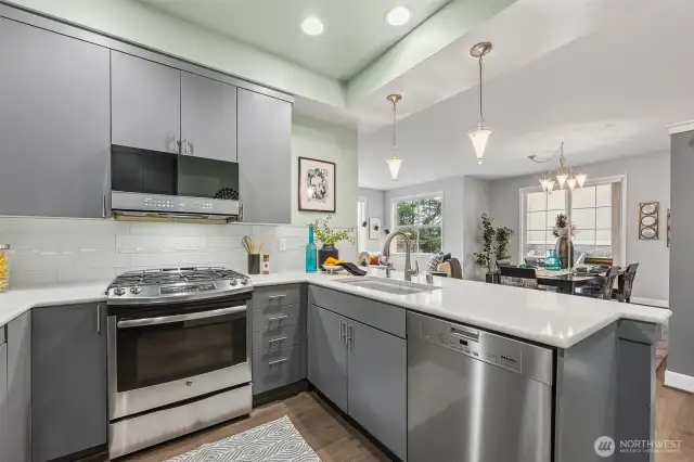 Quartz countertops and stylish tile backsplash, too!