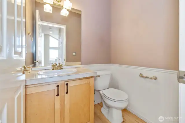 1/2 bath on main level at the end of the hall.