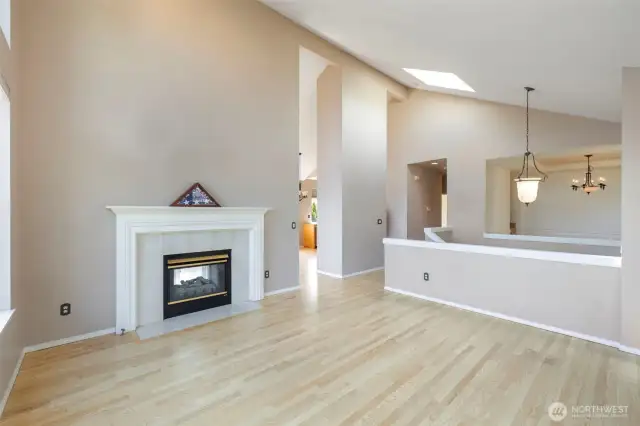 Peek-a-boo to kitchen, stairwell to front door, formal dining room or office