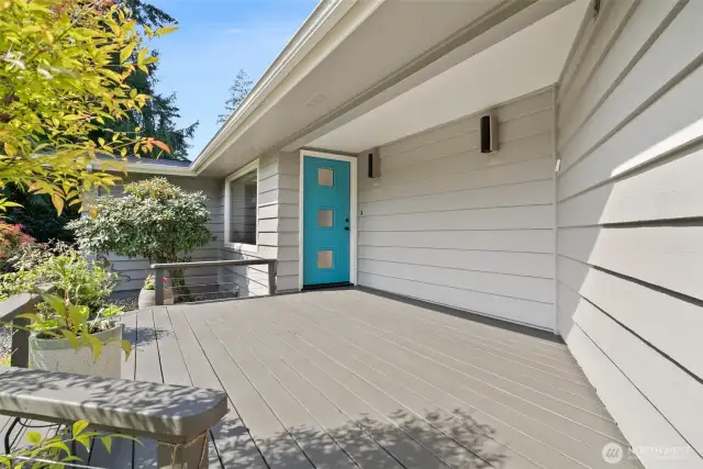 Welcoming front porch with plenty of space to sit and enjoy your garden views.