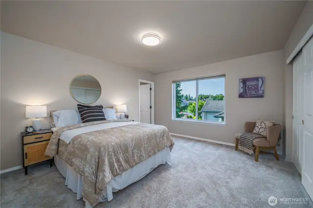 A junior suite upstairs includes its own private full bathroom—ideal for guests or multigenerational living.