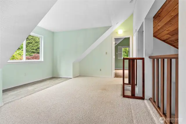 Upstairs loft looking toward upper floor bedroom