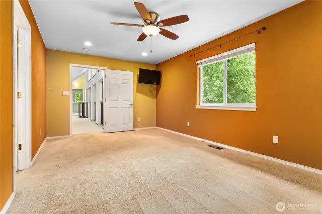Primary bedroom looking toward loft