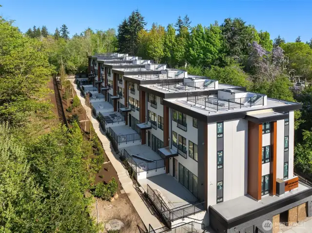 Nestled into the south side of the botanical gardens for privacy.