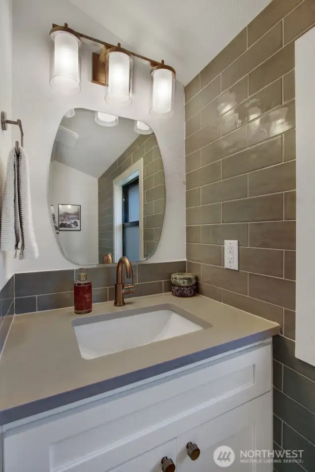 Powder room located upstairs.