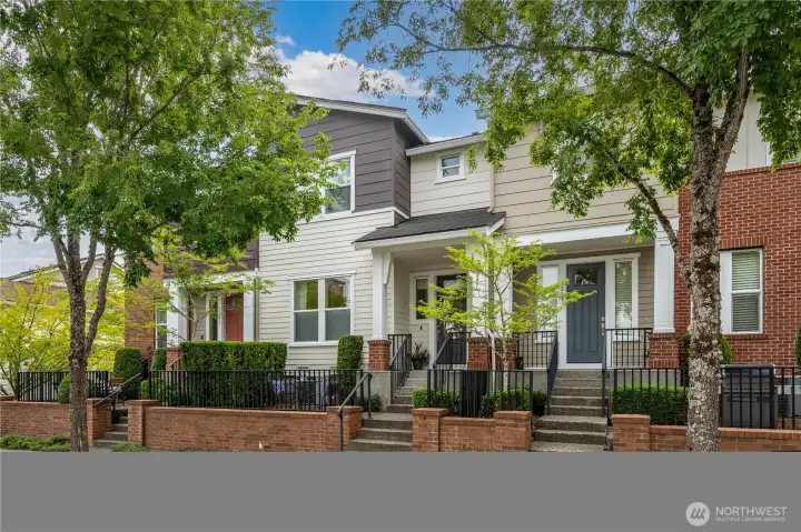 Enjoy sitting on your front patio and waving to your neighbors as they pass on Park Drive!