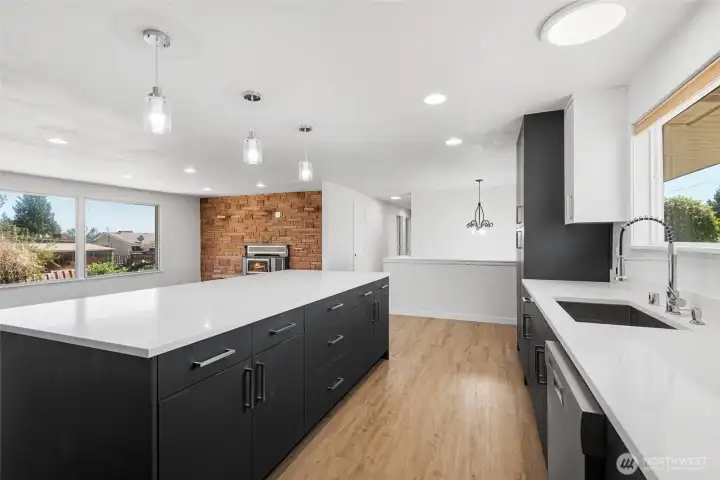 Kitchen has brand new cabinets and beautiful quartz counter tops