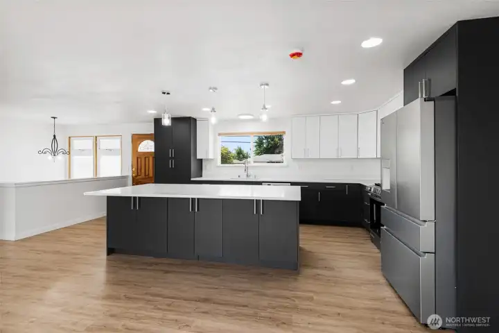 Enjoy entertaining with this generously sized island that opens to the main living space