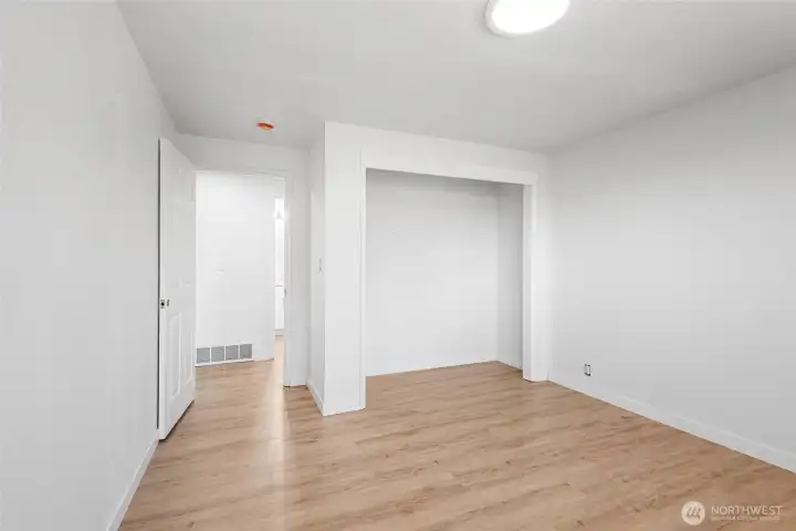 Main level bedroom, full of natural light, ready for you to add your finishing touches.