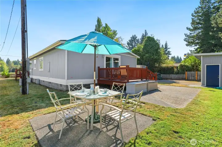 Stamped concrete patio, plus extra patio for dining set, shed, etc.