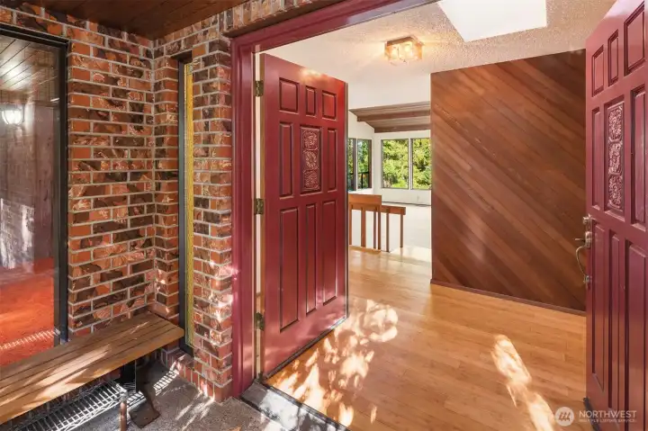 Lovely covered portico and double door entry