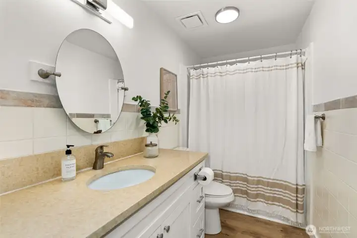 Main Full Bath with Tub and Shower.