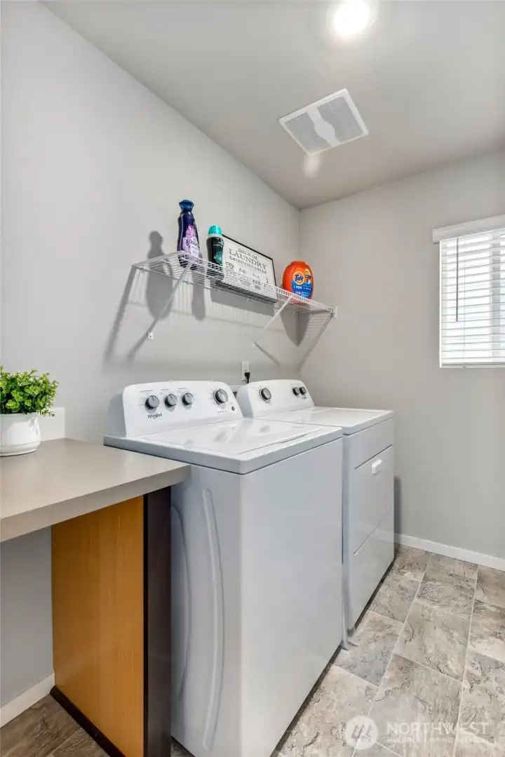 Upstairs laundry room. Washer and dryer included.