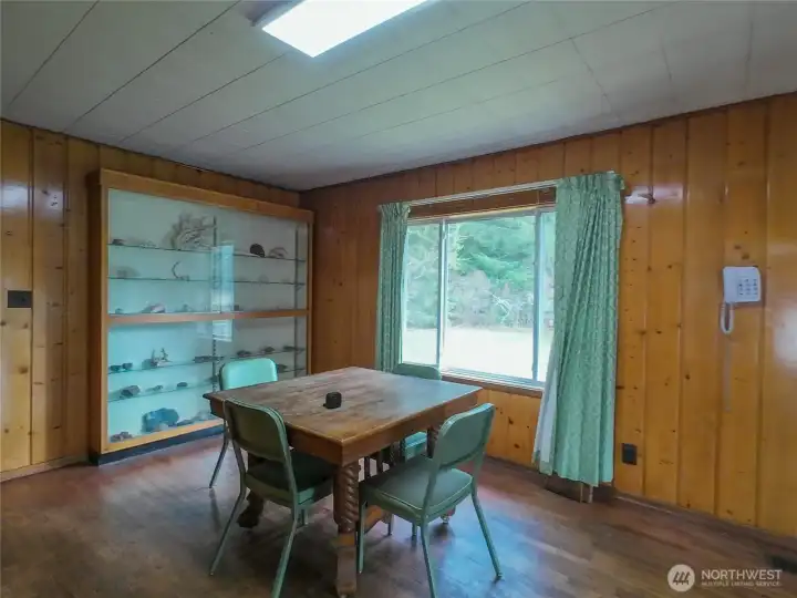 Large dining area. Formal entry on the right and down the hall to the bedrooms on the left