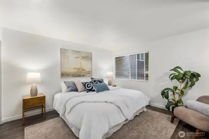 Spacious primary bedroom with plenty of storage.