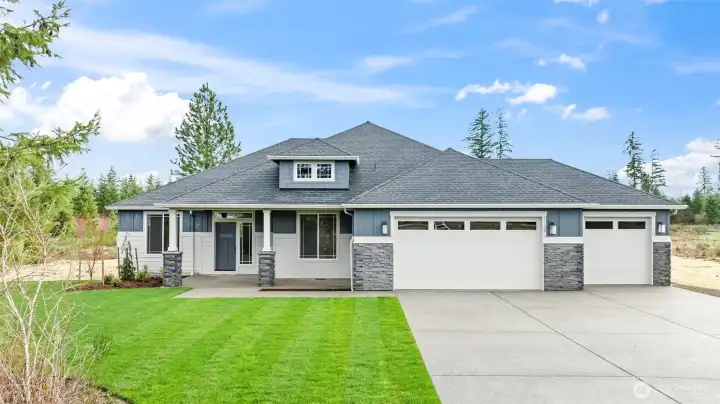 This image depicts a previously built model home for illustrative purposes only. The actual property being offered may differ in design, finishes, and features.