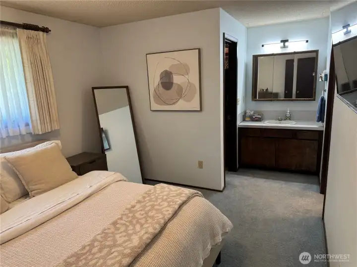 Primary Bedroom And Bathroom.