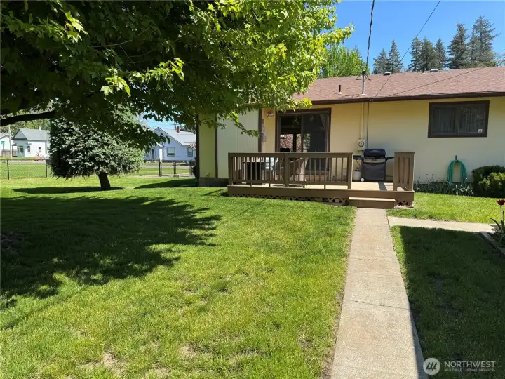 Backyard And Sidewalk to Back Alley.