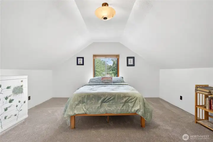 Cozy loft bedroom with fresh paint and new carpet Cozy loft bedroom with fresh paint and new carpet