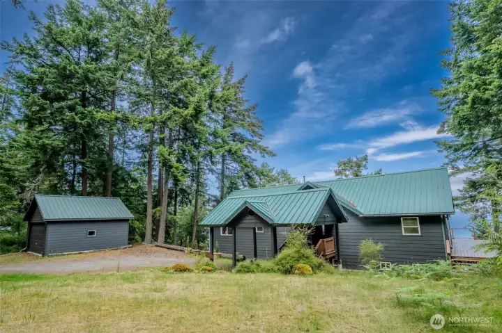 A nice open yard complements the property. Room for a summer garden!