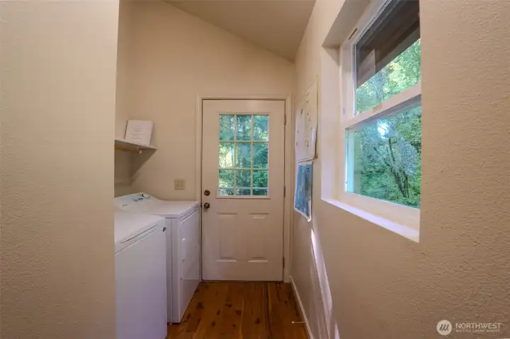 Main-level laundry room for everyday convenience.