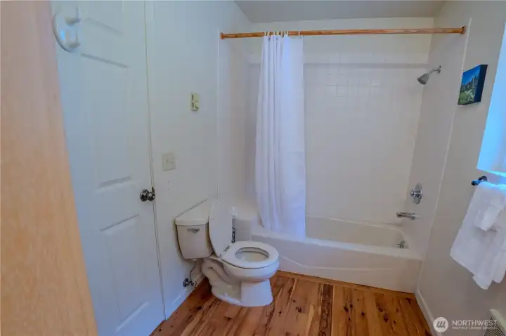Convenient second full bathroom for guests and household use.