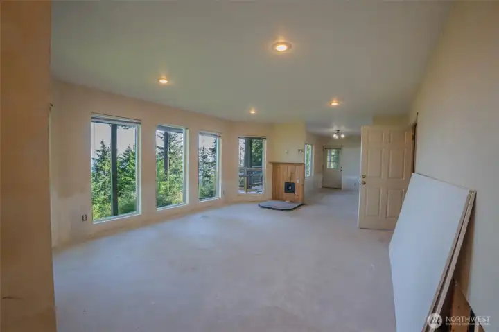 The lower-level living area captures a beautiful water view.