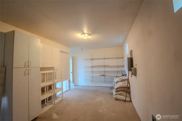 Mechanical with hot water heater and main water control and storage space located on the lower level.