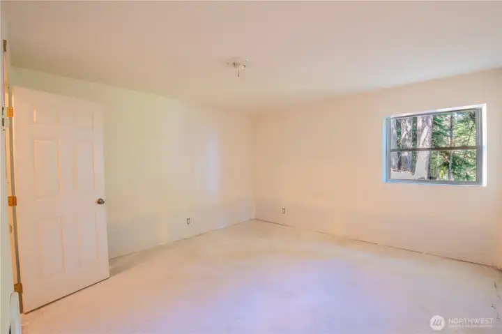 Bonus room on the lower level for guests, office, or studio space.