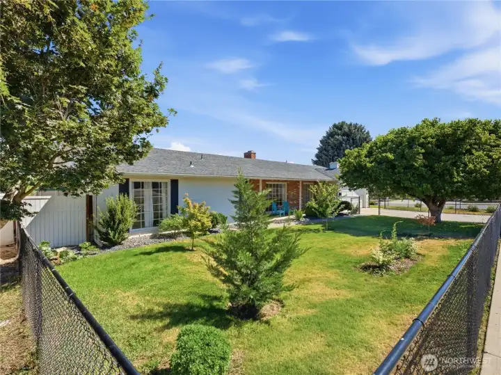 Classic 1969 architecture, mature landscaping, and inviting entry welcome you home. Classic 1969 architecture, mature landscaping, and inviting entry welcome you home.