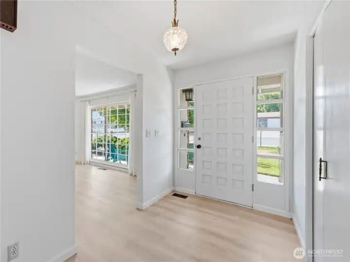 Bright entryway showcasing the home's clean lines and welcoming layout. Bright entryway showcasing the home's clean lines and welcoming layout.