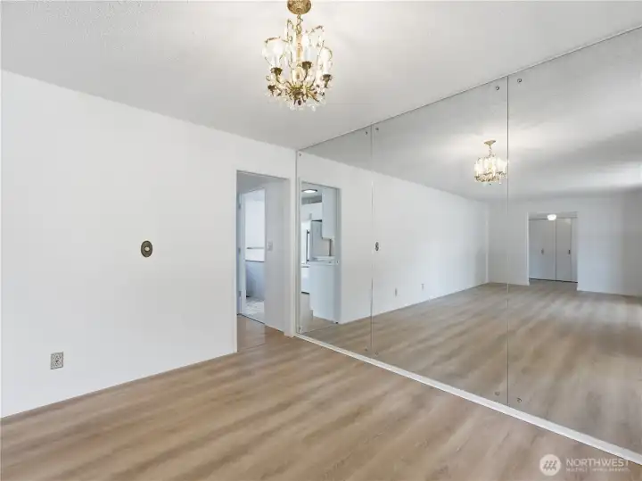 Open connection between the dining room and living room enhances the home's functional Mid-Century Modern-inspired design. Open connection between the dining room and living room enhances the home's functional Mid-Century Modern-inspired design.