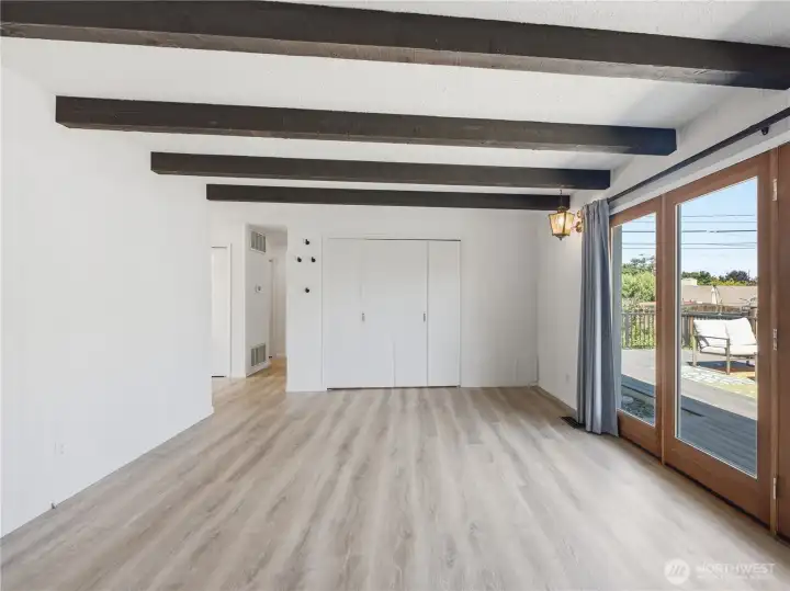 Family room opens directly to the low-maintenance Trex deck, creating the perfect setting for summer BBQs and outdoor gatherings. Family room opens directly to the low-maintenance Trex deck, creating the perfect setting for summer BBQs and outdoor gatherings.