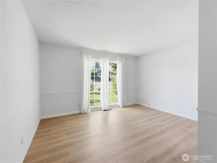 Bright secondary bedroom with stunning floor-to-ceiling windows. Bright secondary bedroom with stunning floor-to-ceiling windows.