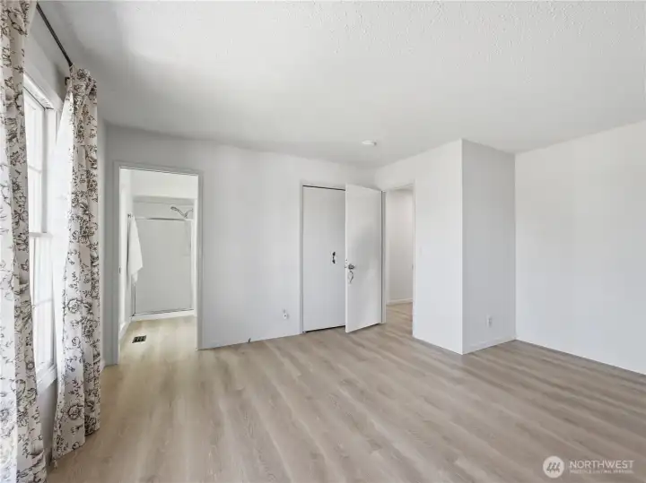 Generous walk-in closet offering ample storage and organization. Generous walk-in closet offering ample storage and organization.