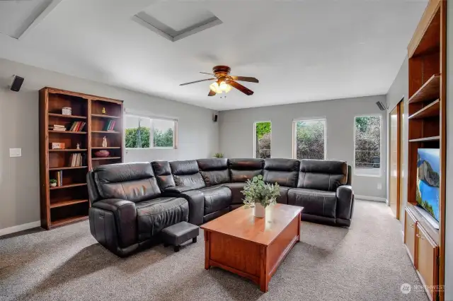 Large bonus room is suitable for game day gatherings or movie nights.