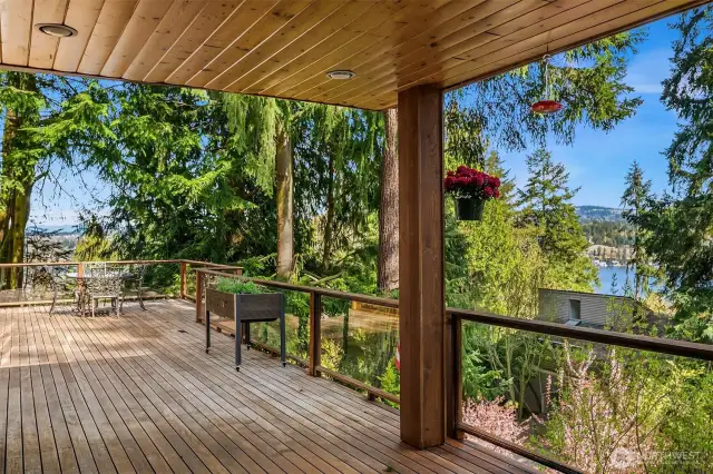 Multiple decks offer extended space for entertaining and enjoying the surroundings. The views to the lake are incredible and "top of the world."