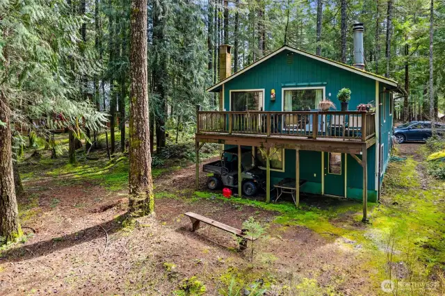 Upper deck and lower patio overlooking backyard.