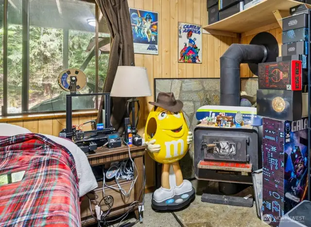 Lower level has a large family room with woodstove, and door to lower patio.