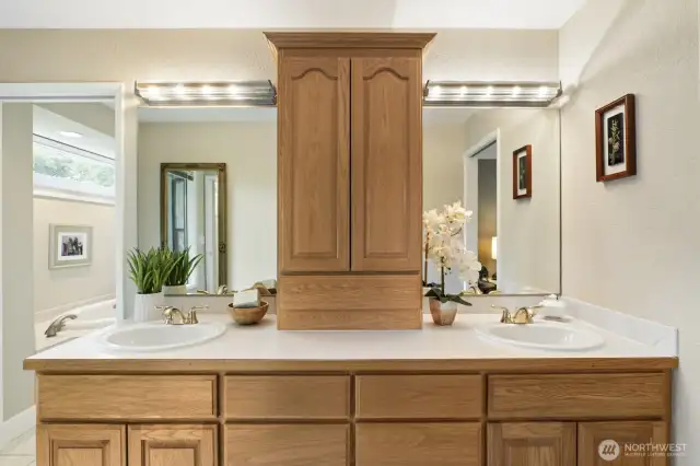 Five piece primary bath including dual vanities.