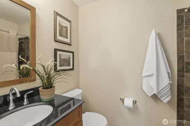 Upstairs hall bath includes tub and shower.