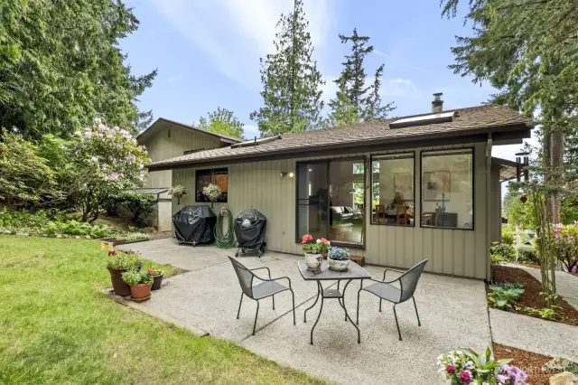 Park-like backyard offers privacy, mature landscaping, and plenty of play and/or garden area.