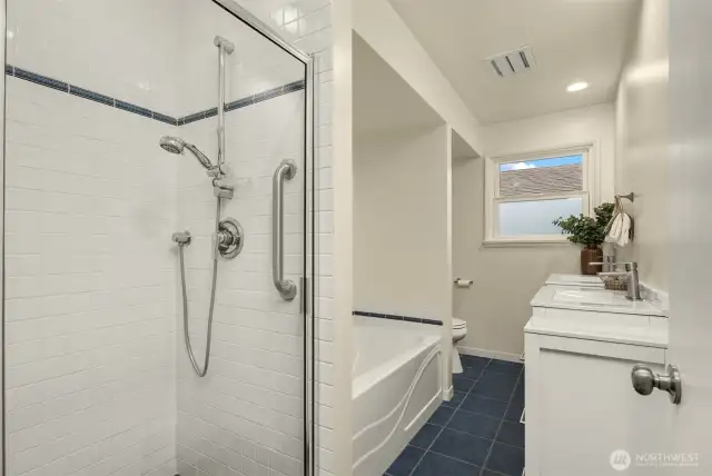 Main floor bathroom with double vanity.