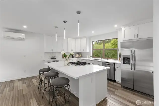 The light filled kitchen is a natural gathering place for entertaining.