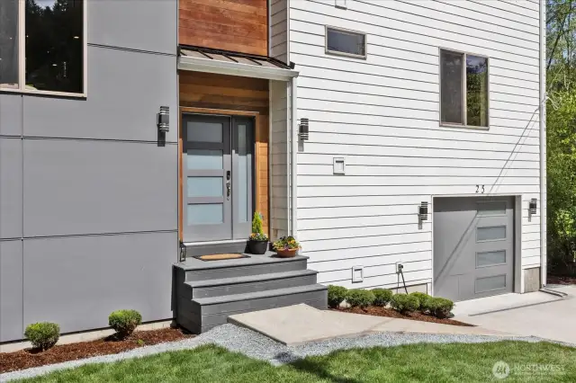 The entryway offers custom wood accents for a Pacific Northwest feel.