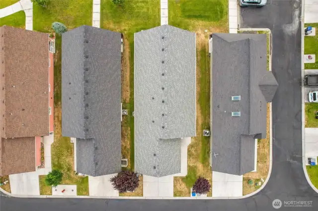 The light gray roof is this home, and you'll see there's extra parking for visitors at the top right, just a home away. More parking is available to the left, near the clubhouse.