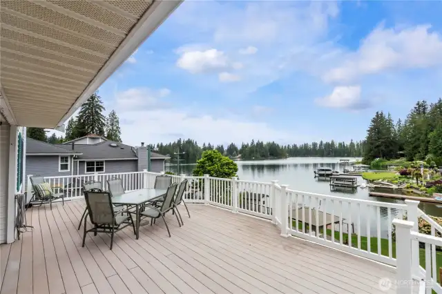 Relax on your covered back deck to soak in the sun and lake views